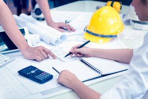 Business Meeting Time with Architecture Interior Designer and Engineering. Meeting and Discussion about Construction Progress in work and Figures denoting of Accounting and Financial